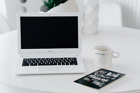 Workplace with laptop on table at home thumbnail