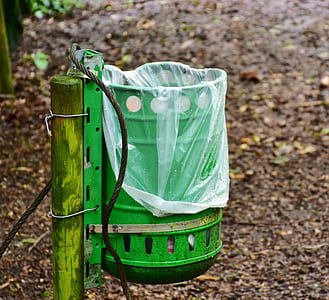 selective focus photo of green metal can with plastic bag thumbnail