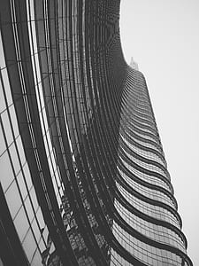 worms eye view of black concrete building thumbnail