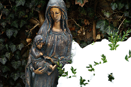 woman carrying baby statue thumbnail