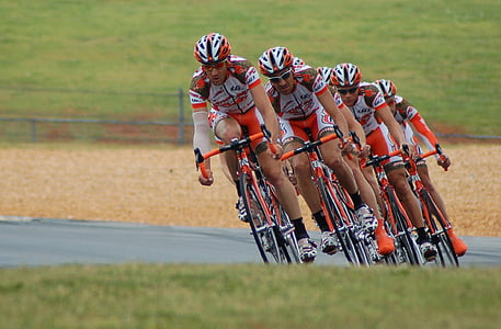 four men riding bicycle on race thumbnail