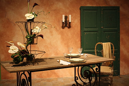 rectangular brown wooden dining table near the green door thumbnail