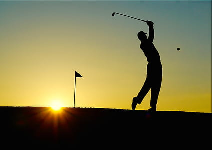 Silhouette of Man Playing Golf during Sunset thumbnail