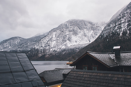 alp mountain near body of water thumbnail