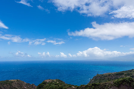 landscape photo of mountain near sea thumbnail