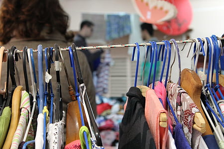 selective focus photo of hanged clothes thumbnail