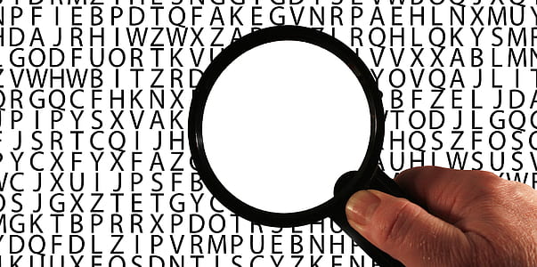 person holding magnifier thumbnail