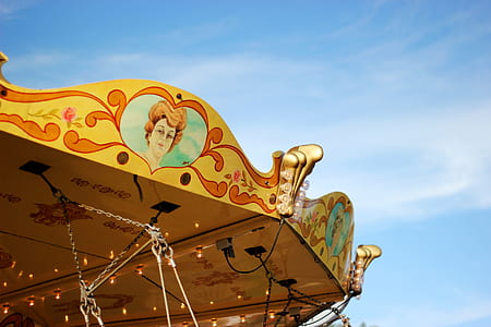 yellow and red carousel ride thumbnail