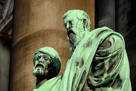 close-up photography of two man wearing green suit statue thumbnail
