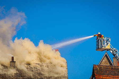 firefighter under blue sky during daytime thumbnail