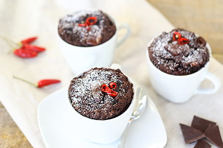 white ceramic mugs with chocolate cakes thumbnail