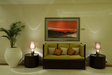 empty bench beside lighted lamps in room thumbnail