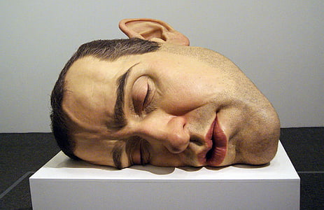 person's head on top of white surface thumbnail