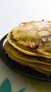 baked pancake on black plate thumbnail