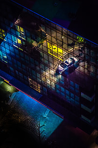 gray sedan on parking lot thumbnail