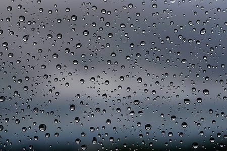 shallow focus photo of raindrops on window thumbnail