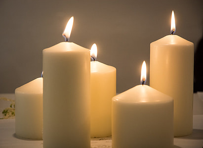 photo of lighted pillar candles thumbnail