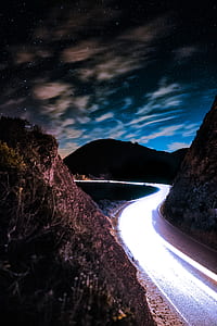 brown mountains during night time thumbnail