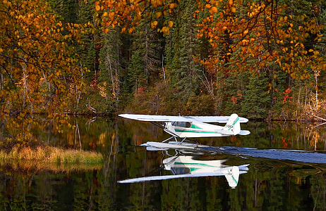 Seaplane landing on the lake in Quebec, Canada thumbnail