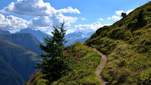 mountain surrounded with green grass thumbnail