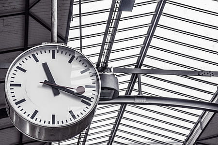 round white and gray analog clock at 11:19 thumbnail
