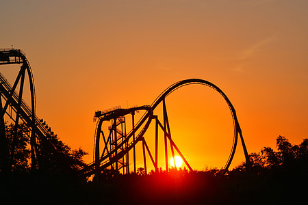 roller coaster rail during sunset thumbnail