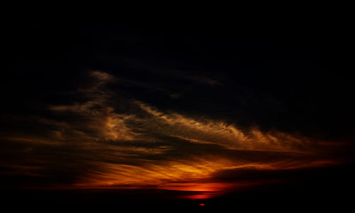 white clouds at golden hour thumbnail