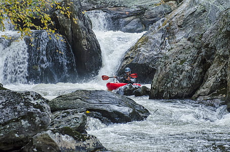 person doing kayak during daytime thumbnail
