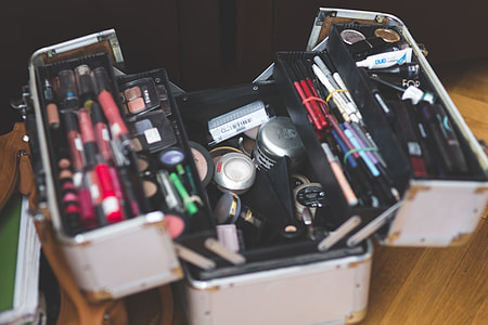 adult's assorted makeup items in train case thumbnail