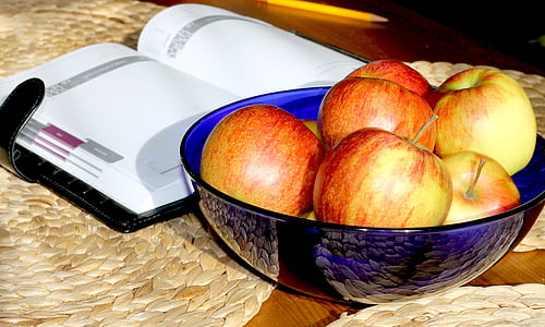 red apples in blue glass bowl thumbnail
