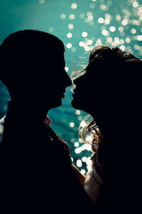 man and woman facing thumbnail
