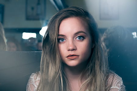 woman sitting in front of people thumbnail