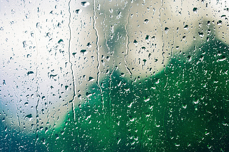 shallow focus photography of raindrops on glass thumbnail