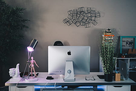 silver iMac on desk thumbnail