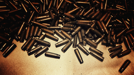 bullet cartridge lot on brown textile thumbnail