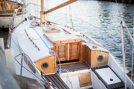 photography of yacht on river thumbnail