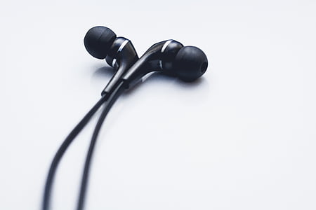 close-up photo of black earbuds thumbnail
