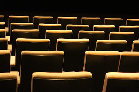 low light photography of lined chairs thumbnail