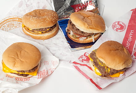 four hamburgers with cheese thumbnail