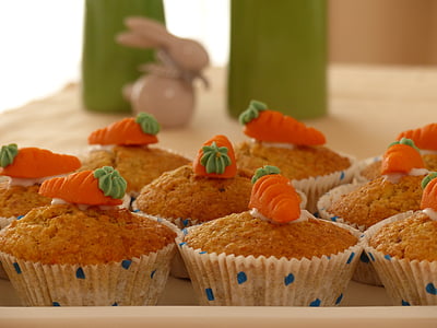 selective focus photo of cupcake with carrot on top thumbnail