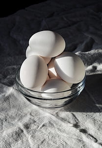 seven white eggs on bowl thumbnail