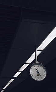 round gray framed analog wall clock at 04:55 thumbnail