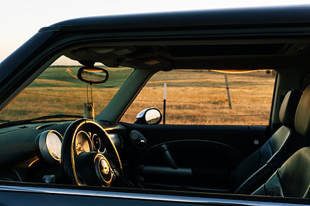 close-up photo of black leather vehicle interior at daytime thumbnail