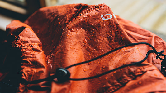 wet orange jacket thumbnail