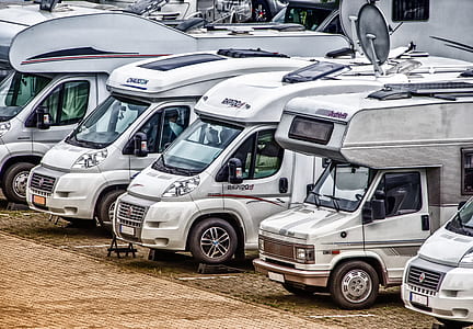 several white recreational vehicles thumbnail