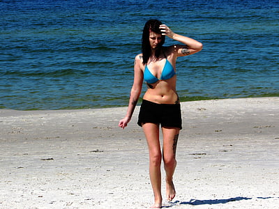 woman standing on beach thumbnail