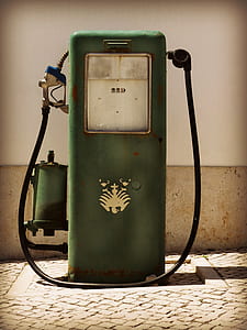 green gas pump beside wall thumbnail