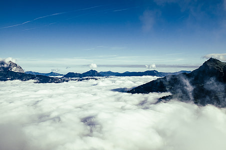 mountains surrounded by clouds thumbnail