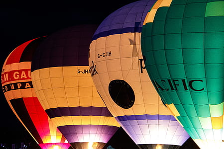 four hot air balloons side-by-side thumbnail