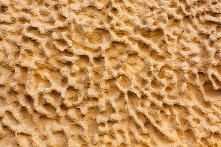 closeup photo of beige stone thumbnail